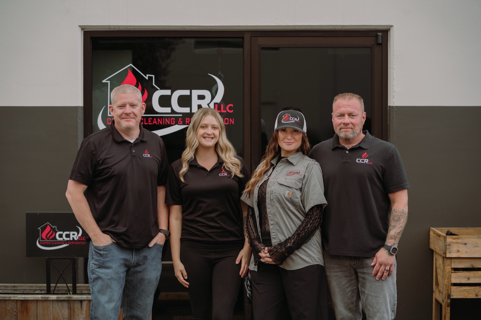 Jon, Grace, Leah and Jesse outside the Cooper Cleaning & Restoration office